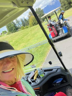 Theodora playing golf at Queenstown Golf New Zealand