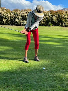 Theodora playing golf at Queenstown Golf New Zealand