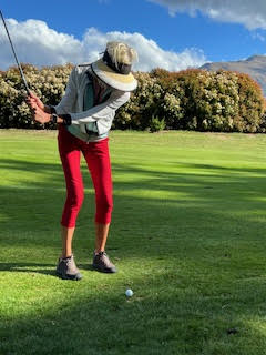 Theodora playing golf at Queenstown Golf New Zealand