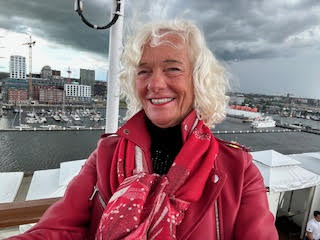 Theodora sailing out of Amsterdam Harbor