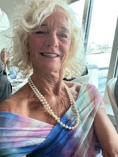 Theodora sailing out of Amsterdam Harbor