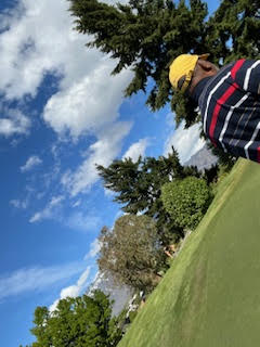 Theodora playing golf at Queenstown Golf New Zealand
