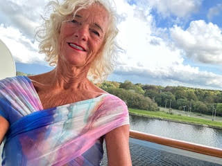 Theodora sailing out of Amsterdam Harbor