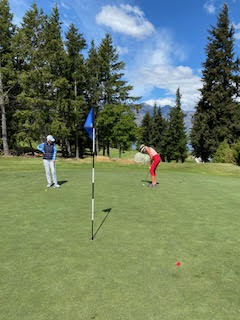 Theodora playing golf at Queenstown Golf New Zealand