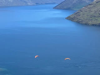Theodora Wind Surfing over the peaks in the High Mountains of New Zealand