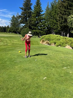 Theodora playing golf at Queenstown Golf New Zealand