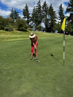 Theodora playing golf at Queenstown Golf New Zealand