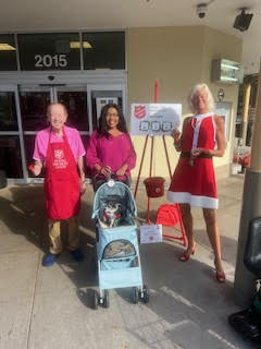 Theodora volunteers at Salvation Army ringing the famous Salvation Army Bell