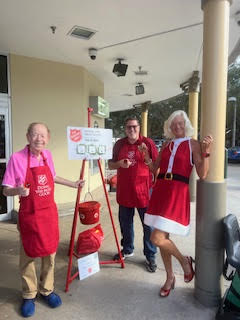 Theodora volunteers at Salvation Army ringing the famous Salvation Army Bell